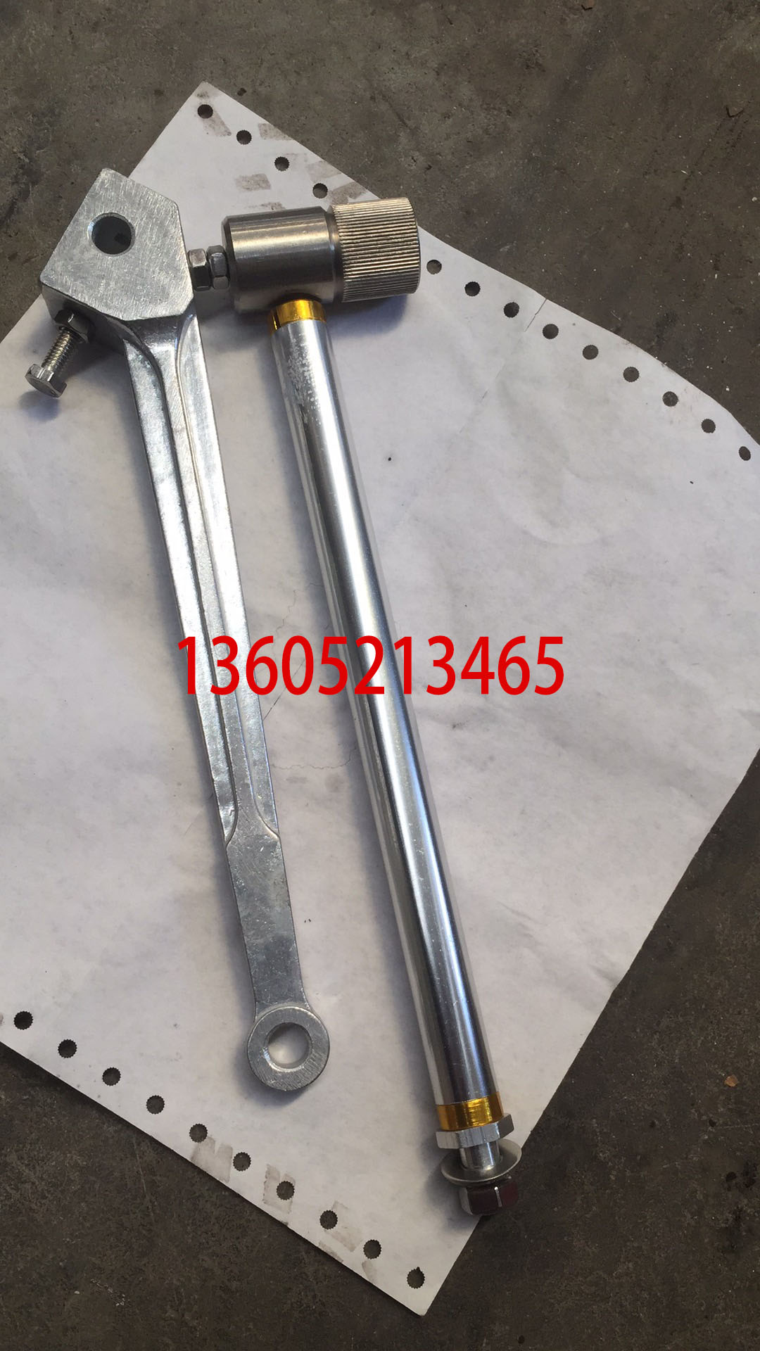Spreader leveling instrument swing arm, sensing ar